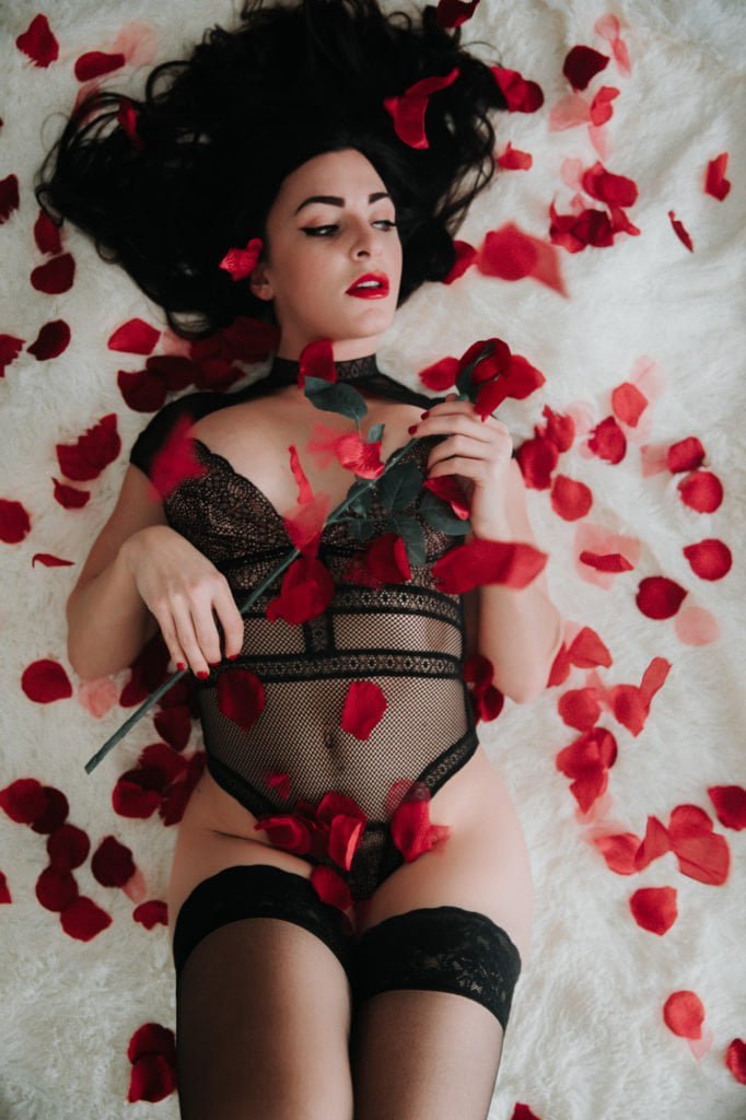 sexy I am yours be mine valentines boudoir photography red rose petals  