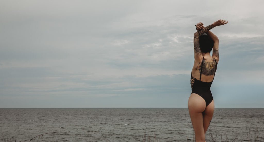 black swimsuit photography beach photo shoot 